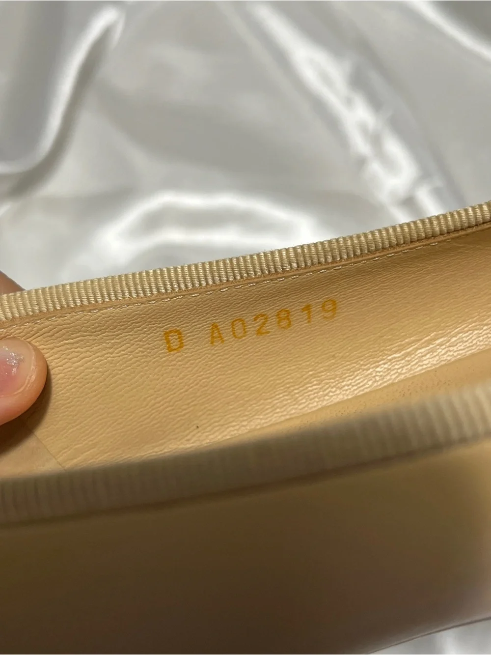 CHANEL Beige Leather Ballet Flats with Black Cap Toe and CC Logo